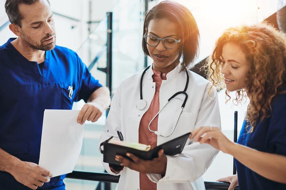 Doctor talking to patients